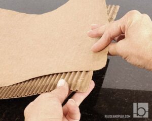 Peel off paper from cardboard