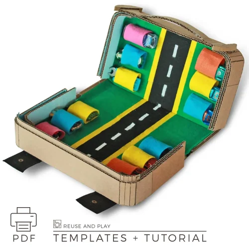 Cardboard toy car travel playset suitcase opened with road and parking spaces for small toy cars