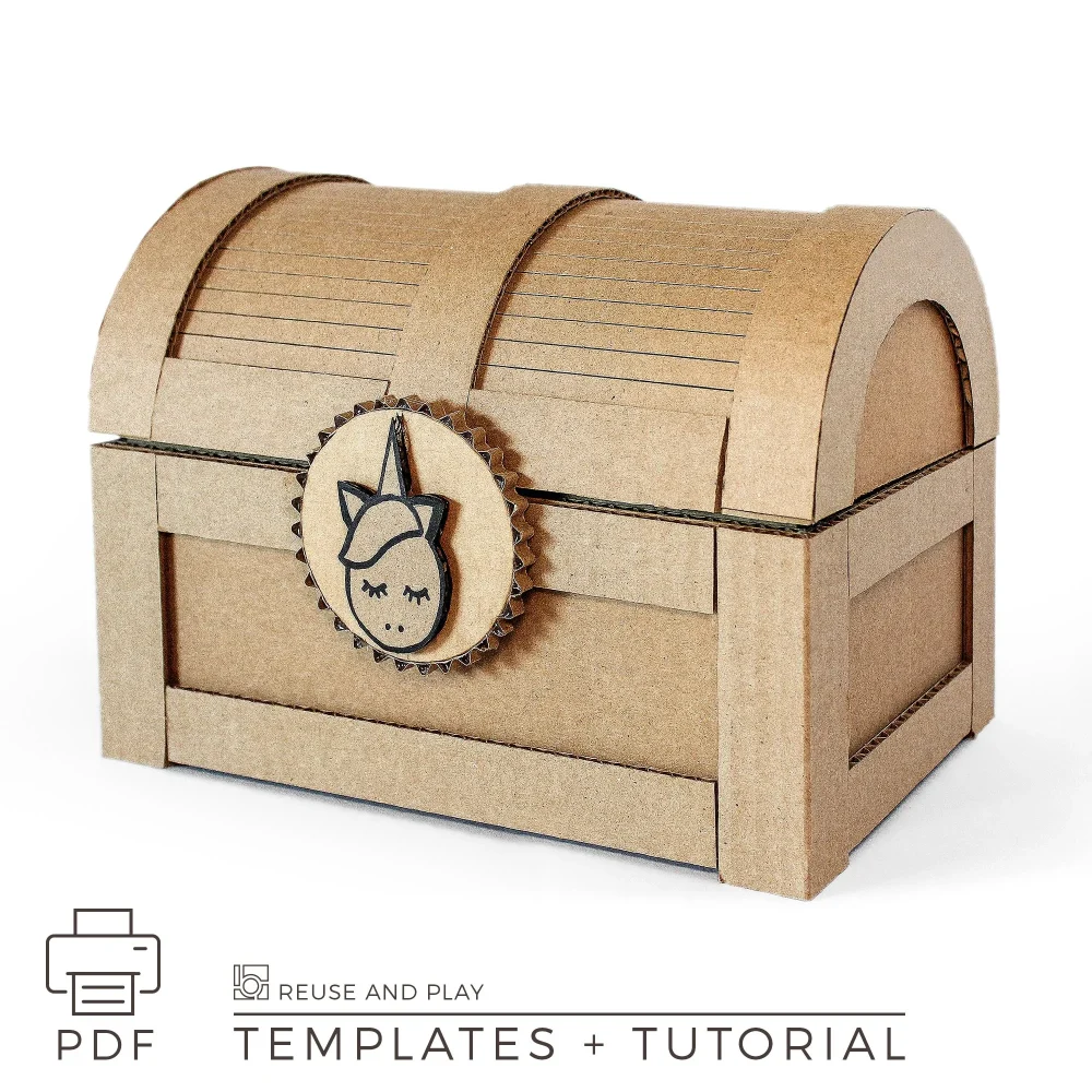 Cardboard treasure chest made from corrugated cardboard with unicorn lock decoration and curved pirate-style lid